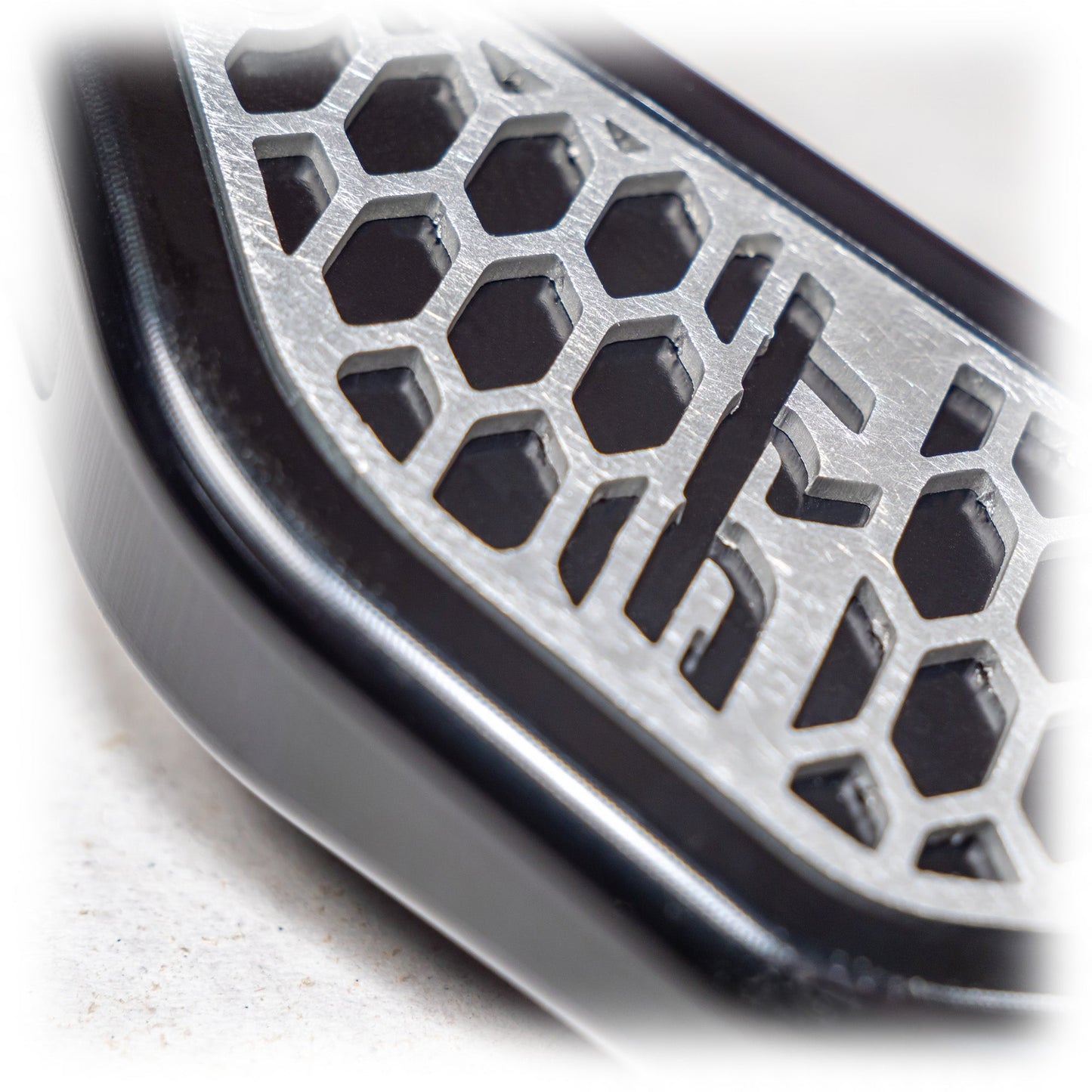 DRT Can Am Maverick R Steering Wheel Adjustment Lever Brand in handle close up