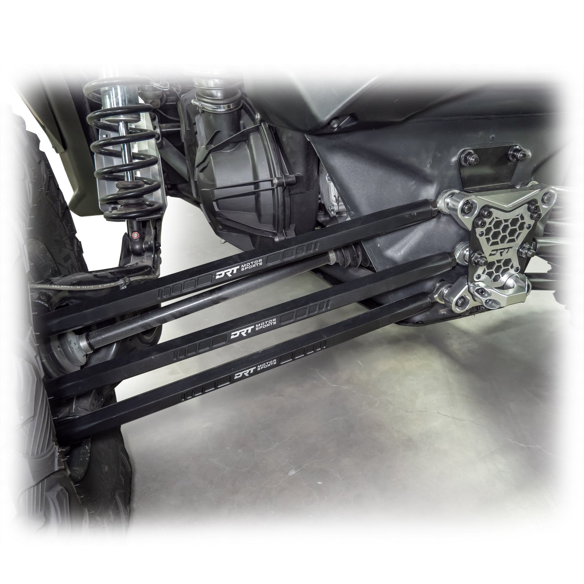Ground clearance snapshot with billet radius rod kit beneath X3 rear end