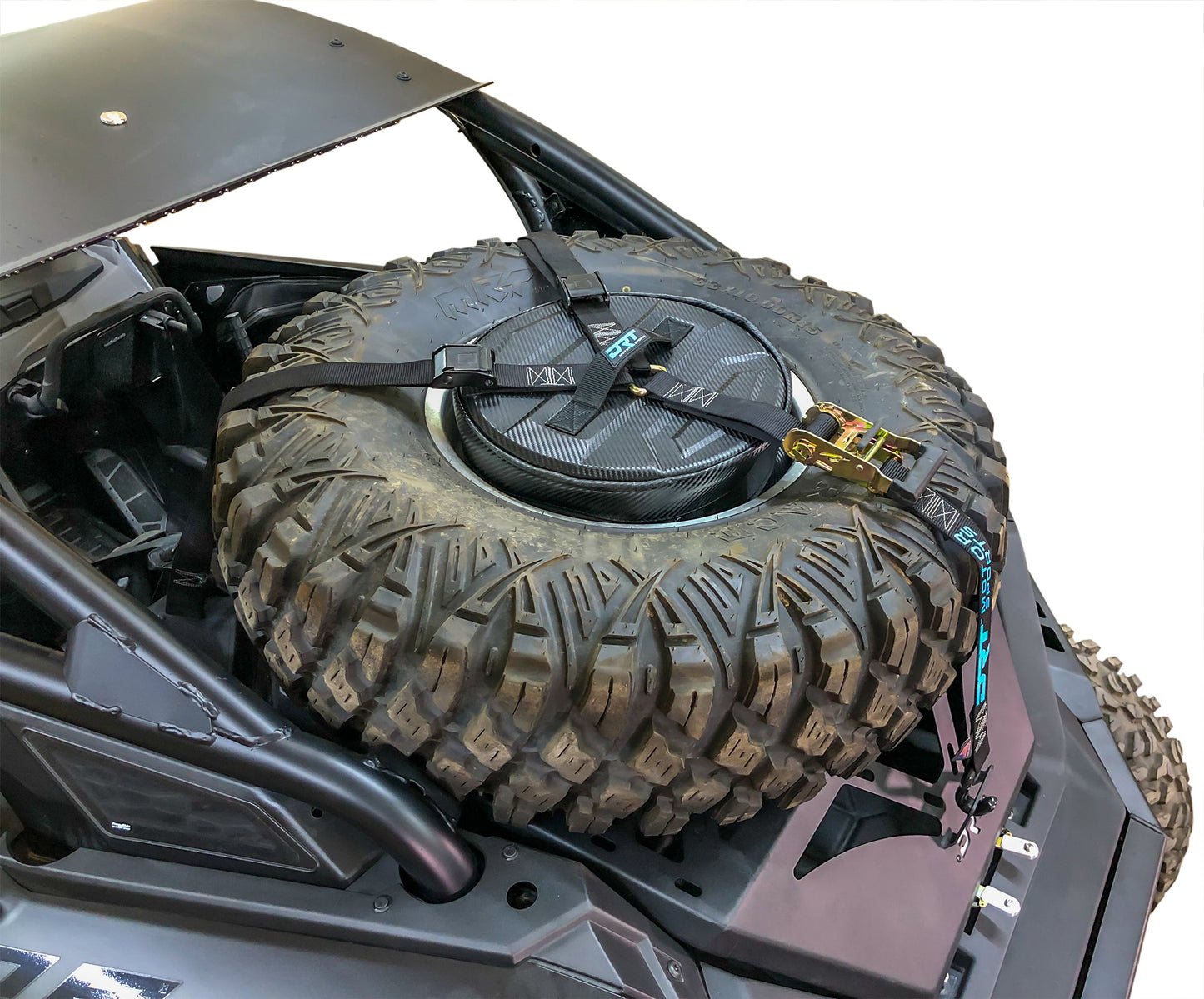 Spare tire storage bag sitting inside inverted off road wheel