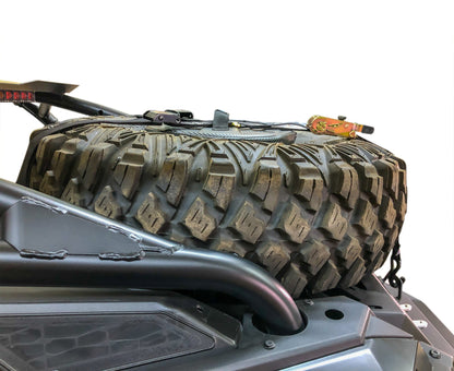 Spare tire storage bag sitting inside inverted off road wheel