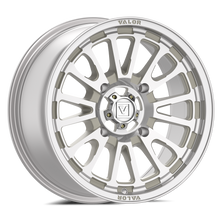 Silver alloy wheel with 'Valor' branding on a white background