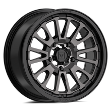 Black alloy wheel on a white background